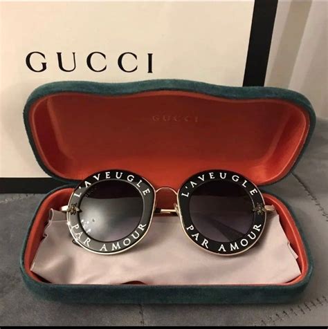 gucci sunglasses l aveugle par amour|love is blind gucci quote.